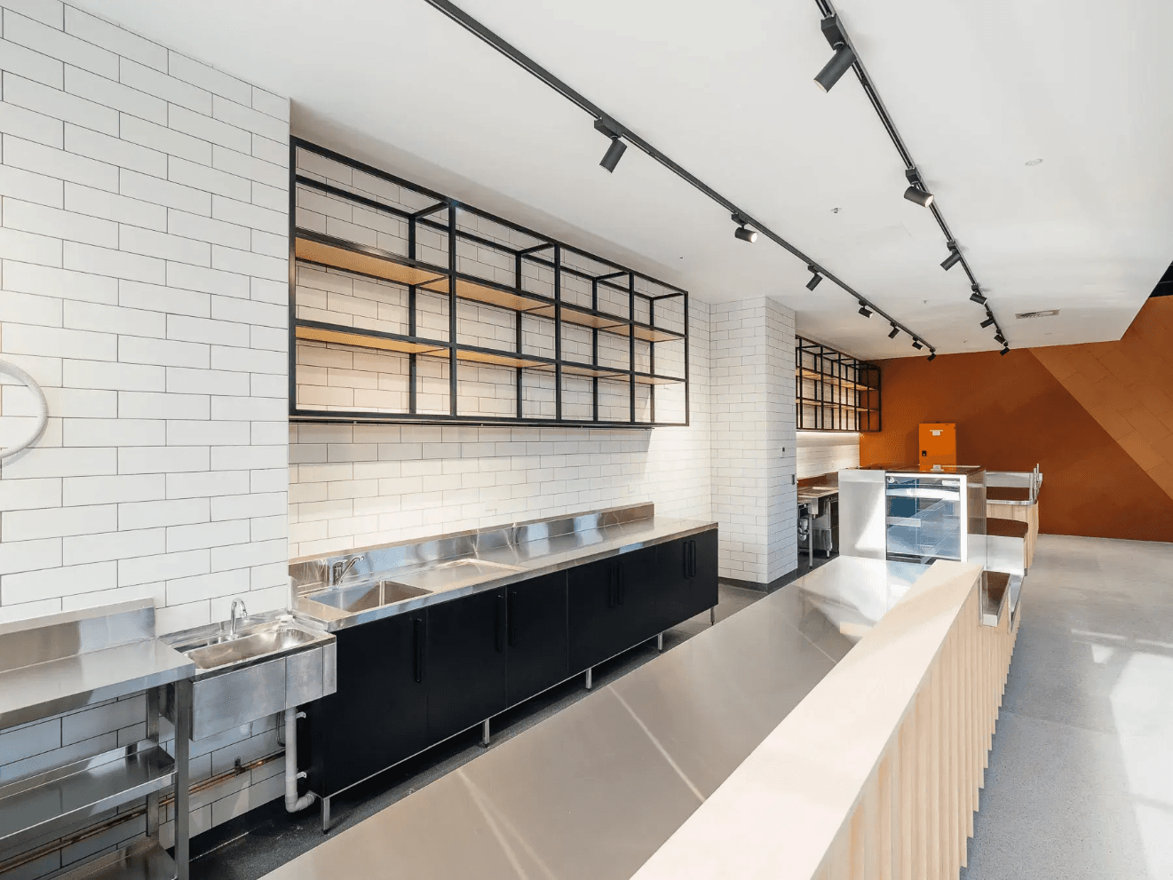 Zoned collaboration areas in an office fitout project in Sydney